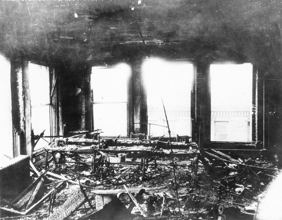 FILE - This March 1911 photo shows fire debris in a burned-out room of the Triangle Shirtwaist factory after a fire killed 146 people, mostly immigrant girls and women, when a fire started at the clothing company in New York. The victims and legacy of the 1911 Triangle Shirtwaist factory fire are being remembered with a new memorial. A structure of steel is being dedicated Wednesday, Oct. 11, 2023, at the Manhattan building where the tragedy took place.