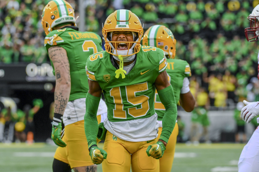 Oregon wide receiver Tez Johnson (15) celebrates after a long gain against Washington State during the first half of an NCAA college football game Saturday, Oct. 21, 2023, in Eugene, Ore.