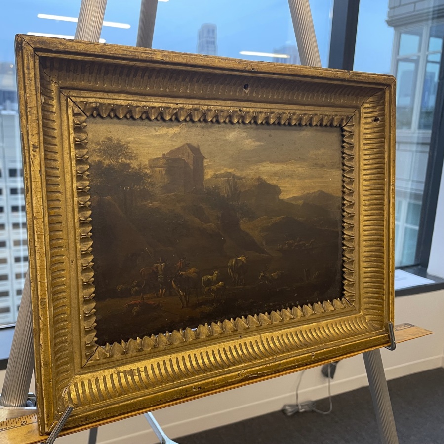 This photo shows the 18th century painting titled "Landscape of Italian Character" by Vienna-born artist Johann Franz Nepomuk Lauterer, Thursday, Oct. 19, 2023 in Chicago. After going missing nearly 80 years ago, the "Landscape of Italian Character", a baroque landscape painting was returned to a German museum representative in a brief ceremony at the German Consulate in Chicago, where the pastoral piece of an Italian countryside was on display.