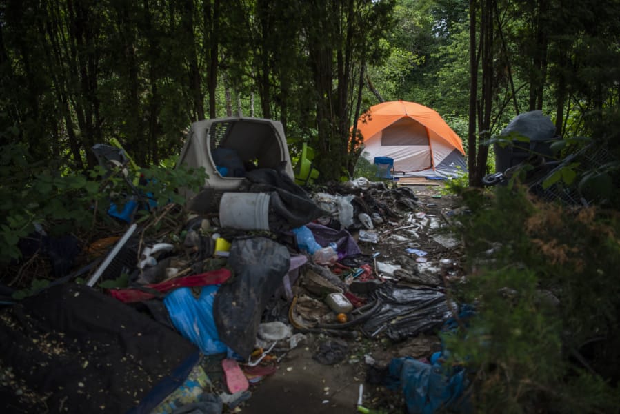 A homeless camp spreads out in a wooded area in Hazel Dell in 2019.