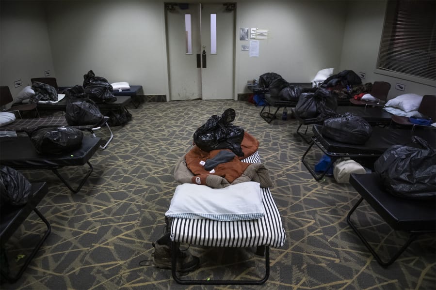 Shelter beds are ready in the Winter Hospitality Overflow shelter at St. Paul Luther Church in Vancouver. Congregations and nonprofit organizations in Clark County are working to expand the number of winter shelter beds available with Satellite Overflow Shelters at Beautiful Savior Lutheran Church, Immanuel Lutheran Church and  River City Church. Other locations will provide more beds in the event of extreme winter weather.