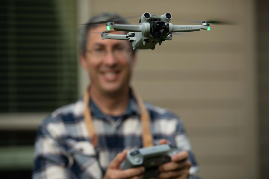 John Veneruso flies a drone at his home in the Felida neighborhood north of Vancouver city limits. The hobbyist is careful to comply with Federal Aviation Administration regulations.