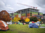 Tents sit in an empty lot behind Vancouver City Hall. Vancouver City Manager Eric Holmes declared a civic emergency on Friday in response to what the city describes as a "perfect storm" of increased criminal activity and drug use in camps and a growing disinterest among camp residents in getting help.