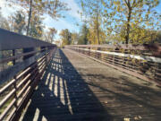 A section of the Washougal River Greenway Trail, this long pedestrian bridge offers elegant views of the river below.