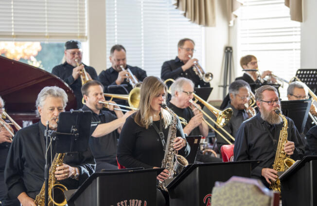 The Beacock Music Jazz Band brings the swing to Clearwater Springs Assisted Living one morning in November. Senior homes are &ldquo;a great circuit&rdquo; for senior musicians, said bandleader Gene Burton, on saxophone at front right.