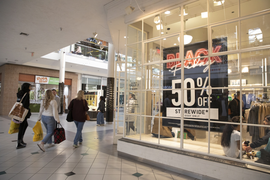 Shoppers look for deals at Vancouver Mall on Black Friday, a day that is a popular time for people to buy necessities.