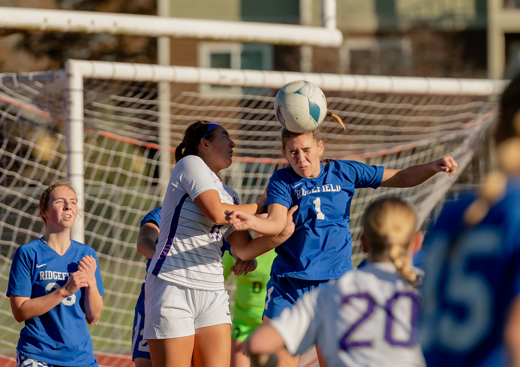 Ridgefield junior midfielder Nora Martin wins a header on a corner kick in a 2A State girls soccer semifinal game on Friday, Nov. 17, 2023, at Mount Tahoma Stadium in Tacoma.
