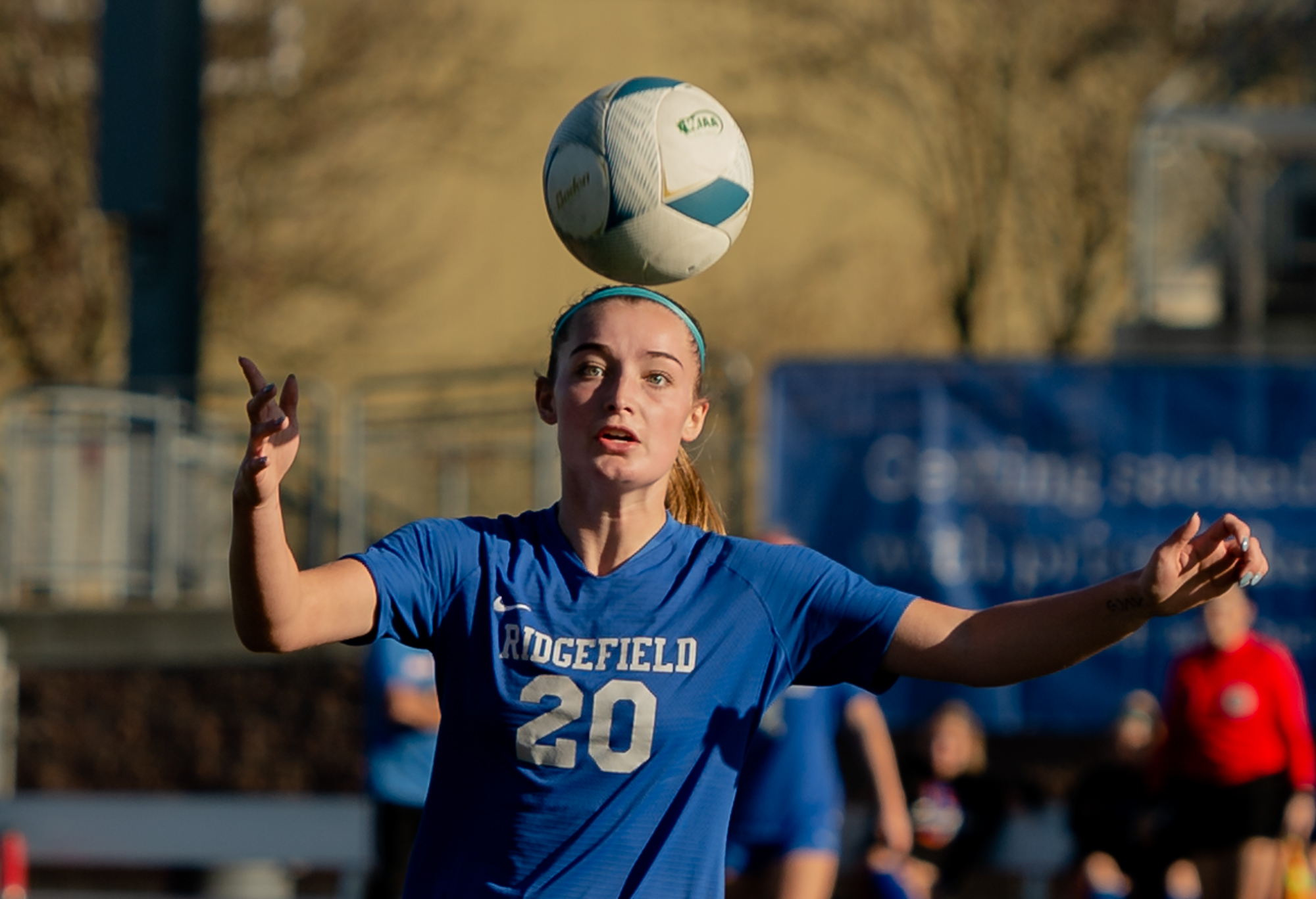 Ridgefield junior forward Baylee Bushnell corrals a bouncing ball in a 2A State girls soccer semifinal game on Friday, Nov. 17, 2023, at Mount Tahoma Stadium in Tacoma.