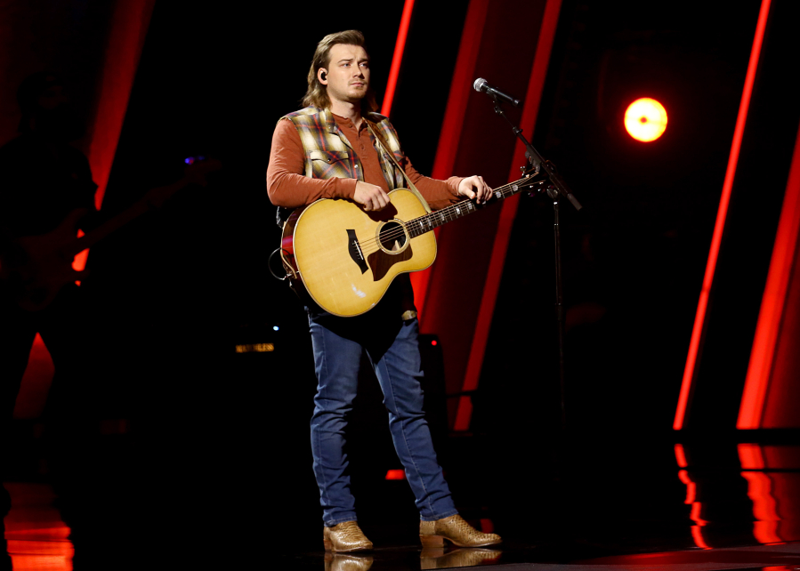 Morgan Wallen performs at Nashville&rsquo;s Music City Center for The 54th Annual CMA Awards, broadcast on Nov. 11, 2020, in Nashville, Tenn. As Grammy nominations are released Friday, his fans will learn whether the academy is ready to embrace him nearly three years after he was caught on video drunkenly using a racial slur.