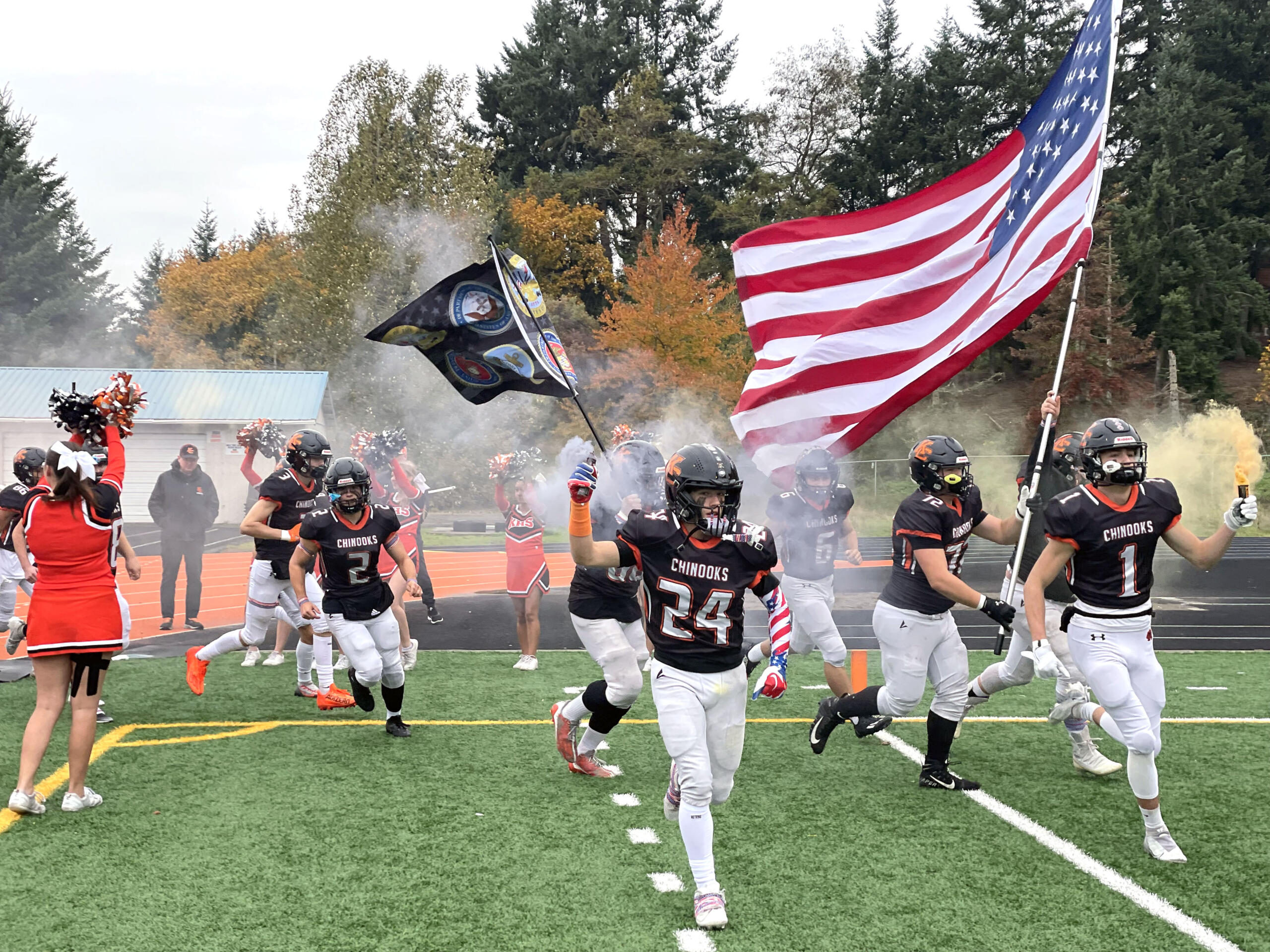Kalama football players run on to the field prior to their Class 2B state playoff game against Friday Harbor on Friday, Nov. 10, 2023, at Chinook Stadium in Kalama.
