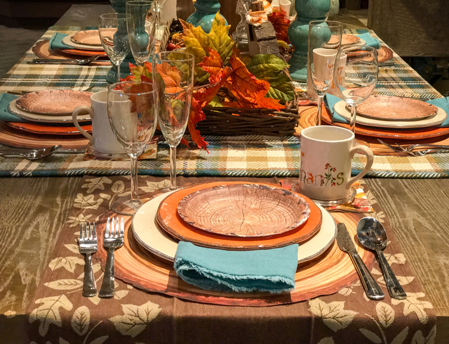 Thanksgiving decor lends itself to warm, earthy colors with the glow of candles and warm feelings.
