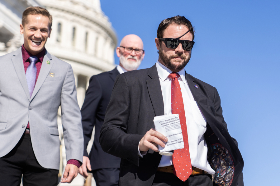 Reps. Dan Crenshaw, R-Texas, right, Rich McCormick, R-Ga., left, and Derrick Van Orden, R-Wis., leave the U.S. Capitol after the last votes of the week on Friday, Nov. 3, 2023.