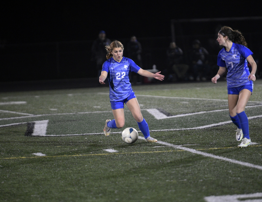 Madisen Newbury (22) of La Center gives instructions to teammate Riley Schultz (7) during the Wildcats&iacute; 3-2 win over Meridian of Bellingham in a Class 1A girls soccer state tournament first-round match at Woodland High School on Wednesday, Nov. 8, 2023.