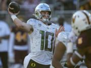 Oregon quarterback Bo Nix (10) throws during the second half on an NCAA college football game against Arizona State, Saturday, Nov. 18, 2023, in Tempe, Ariz.