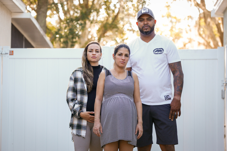 Tampa residents Liliana Jimenez, left, Magela Gongora and Yusmier Mesa have received the I-220A form, which is given to people who have been freed from custody. But it also places them in the deportation process.