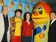 From left to right: Series co-creator Marty Krofft, actor David Arquette, actress Courteney Cox Arquette, series character H.R. Pufnstuf and series co-creator Sid Krofft attend the DVD release party for the Saturday Morning Television Series &ldquo;H.R. Pufnstuf&rdquo; on Feb. 12, 2004, at The Museum of Television and Radio, in Beverly Hills, Calif.