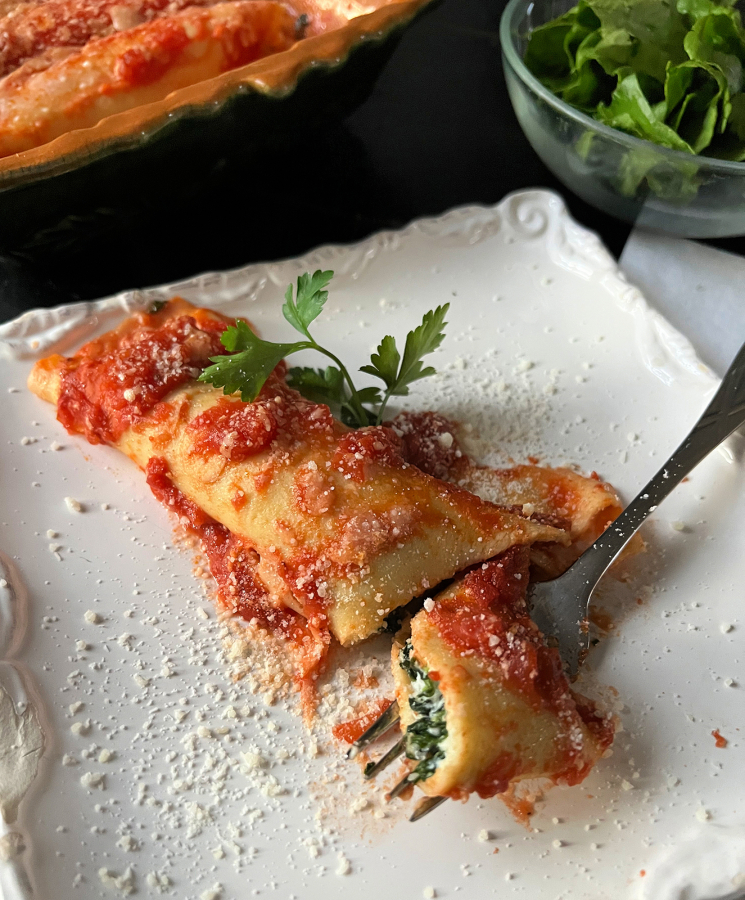 Cheese-and spinach-stuffed manicotti crafted with homemade crepes and a simple marinara will lift you out of winter&rsquo;s doldrums.