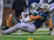 Skyview's Cameron Crooks brings down Skyline's Luke Morgan during Saturday's game at Kiggins Bowl. Skyview won, 42-7, to advance to next weekend's 4A state quarterfinal.