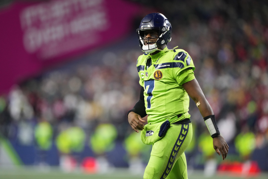 Seattle Seahawks quarterback Geno Smith (7) walks off the field during the second half of an NFL football game against the San Francisco 49ers, Thursday, Nov. 23, 2023, in Seattle.