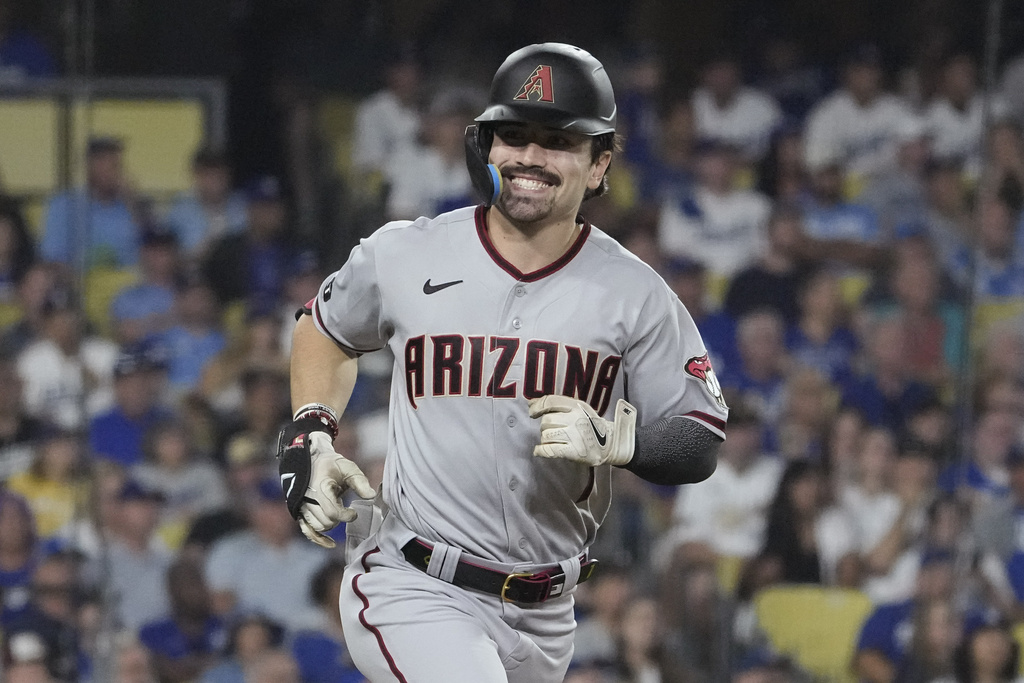 Arizona Diamondbacks' Corbin Carroll, along with Baltimore Orioles infielder Gunnar Henderson were unanimous selections for the Jackie Robinson Rookie of the Year awards, announced Monday, Nov. 13, 2023, with Henderson winning the American League honor and Carroll earning the National League award. (AP Photo/Mark J.