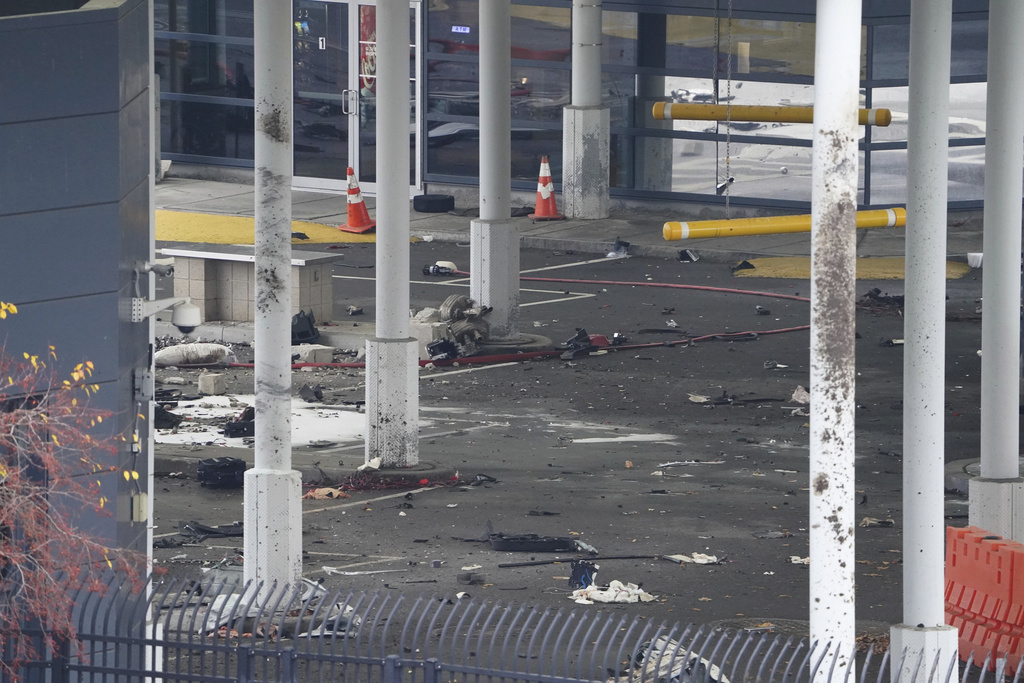 Debris is scattered about inside the customs plaza at the Rainbow Bridge border crossing, Wednesday, Nov. 22, 2023, in Niagara Falls, N.Y. The border crossing between the U.S. and Canada has been closed after a vehicle exploded at a checkpoint on a bridge near Niagara Falls. The FBI's field office in Buffalo said in a statement that it was investigating the explosion on the Rainbow Bridge, which connects the two countries across the Niagara River.