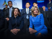 Vice President Kamala Harris and first lady Jill Biden listen as President Joe Biden speaks at welcome reception for Asia-Pacific Economic Cooperative leaders at the Exploratorium, in San Francisco, Wednesday, Nov, 15, 2023.
