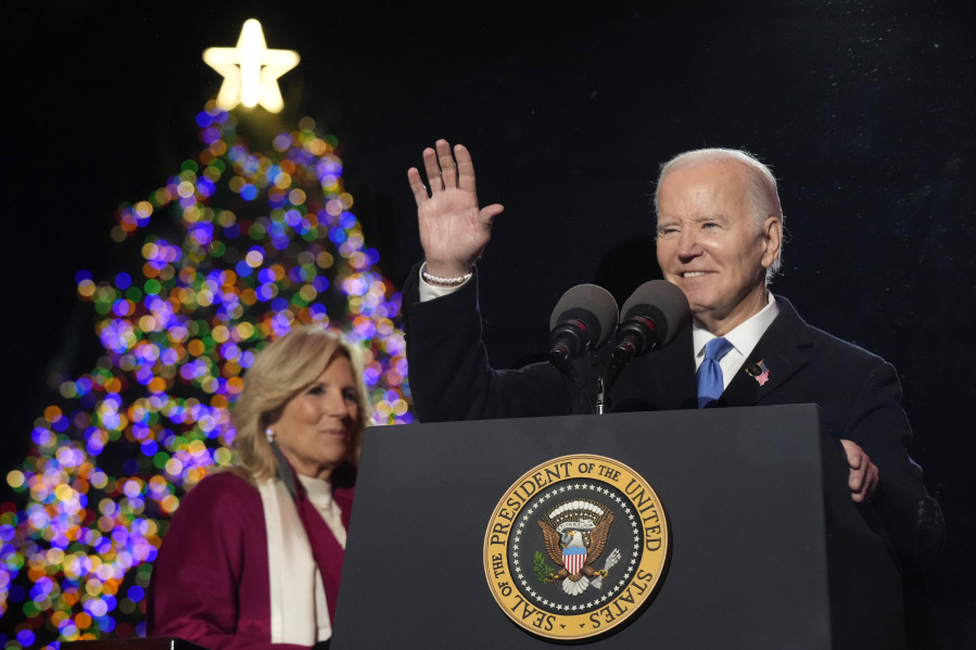 President Joe Biden and first lady Jill Biden, speak after lighting the National Christmas Tree on the Ellipse, near the White House, Thursday, Nov. 30, 2023, in Washington.