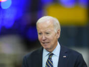 FILE - President Joe Biden speaks at the Amtrak Bear Maintenance Facility, Monday, Nov. 6, 2023, in Bear, Del. Biden on Thursday is heading to Belvidere, Ill., to celebrate an auto plant that has reopened as part of the resolution of a targeted strike by the United Auto Workers union.