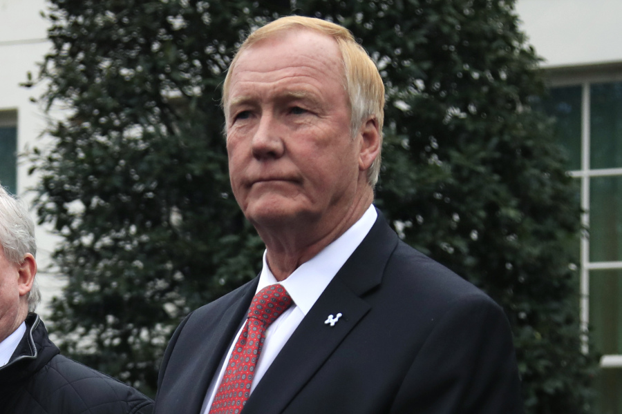 FILE - NuScale Power chairman and CEO John L. Hopkins, listen outside the West Wing of the White House in Washington, following the energy executives' meeting with President Donald Trump on Feb. 12, 2019. A project to build a first-of-a-kind small modular nuclear reactor power plant was terminated Nov. 8, 2023, another blow to the Biden administration's clean energy agenda following cancellations last week of two major offshore wind projects. Oregon-based NuScale Power has the only small modular nuclear reactor design certified for use in the United States.