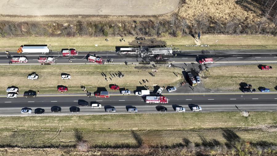 Both directions of Interstate 70 are closed in Licking County, Ohio,  near the State Route 310 interchange after a fatal accident on Tuesday, Nov. 14, 2023. A charter bus carrying students from a high school was rear-ended by a semi-truck on the Ohio highway.