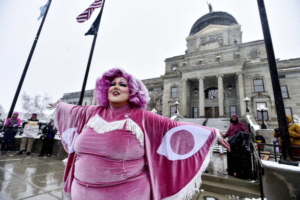 FILE - Scenes from a drag show at the Montana Capitol held in protest to a slate of bills aimed at how trans Montanans live, April 13, 2023, in Helena, Mont. Opponents of a law that restricted drag performances and banned drag reading events at public schools and libraries asked a federal judge late Tuesday, Nov. 28 to declare the law unconstitutional without the case going to trial. The motion for summary judgment argues there is no dispute over key facts in the case. The law has already been blocked under a preliminary injunction issued in October.