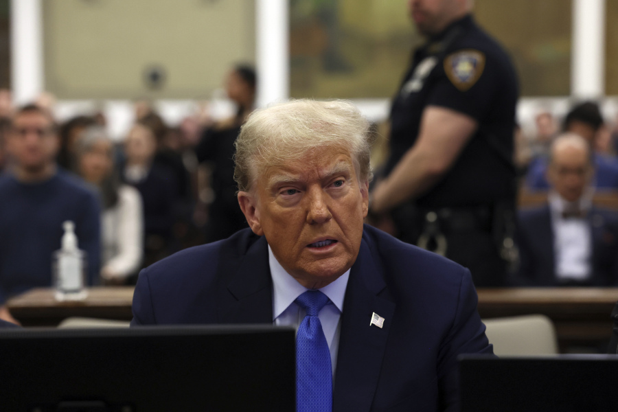 FILE - Former President Donald Trump waits to take the witness stand during his civil fraud trial at New York Supreme Court, Monday, Nov. 6, 2023, in New York.  A judge in Michigan is expected to hear arguments as to whether or not Secretary of State Jocelyn Benson has the authority to keep Trump&rsquo;s name off any state ballot for president.
