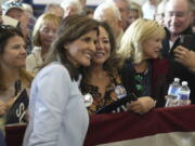 GOP presidential hopeful Nikki Haley takes selfies with supporters after a campaign event on Monday, Nov. 27, 2023, in Bluffton, S.C. Haley is among a cluster of Republican candidates competing for second place in a GOP Republican primary thus far largely dominated by former President Donald Trump.