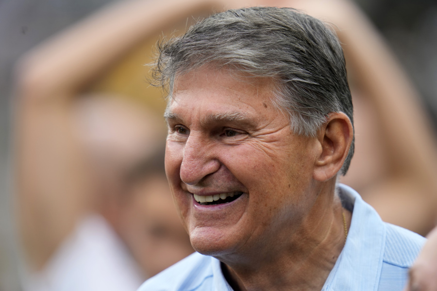 FILE - Sen. Joe Manchin, D-W.Va., visits the sidelines at Acrisure Stadium during warm ups before an NFL football game between the Pittsburgh Steelers and the San Francisco 49ers in Pittsburgh, Sept. 10, 2023. Manchin announced he won&rsquo;t seek reelection in 2024, giving Republicans a prime opportunity to gain a seat in the heavily GOP state. (AP Photo/Gene J.
