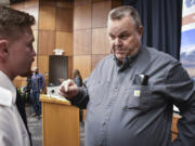 Sen. Jon Tester, D-Mont., speaks with a constituent prior to a town hall meeting hosted by the Democrat at Montana Technological University, Nov. 10, 2023, in Butte, Mont. Tester is seeking re-election to a fourth term.