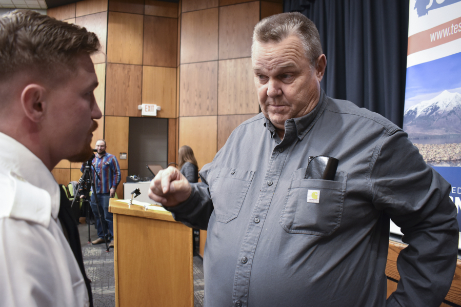 Sen. Jon Tester, D-Mont., speaks with a constituent prior to a town hall meeting hosted by the Democrat at Montana Technological University, Nov. 10, 2023, in Butte, Mont. Tester is seeking re-election to a fourth term.