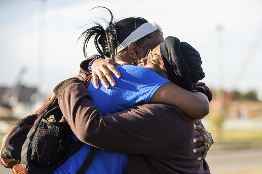 Sheneen McClain, right, mother of Elijah McClain, and friend and supporter MiDian Holmes embrace after suspended Aurora, Colo., Police officer Nathan Woodyard was acquitted in the 2019 death of Elijah, outside of the Adams County Justice Center on Monday, Nov. 6, 2023, in Brighton, Colo.