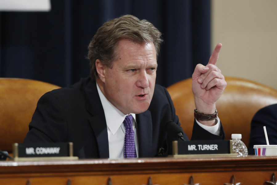 FILE - Rep. Mike Turner, R-Ohio, speaks during a House Intelligence Committee hearing on Capitol Hill in Washington, Nov. 20, 2019. Turner, the Republican chairman of the House Intelligence Committee, is calling for the renewal of a key U.S. government surveillance tool while also proposing a series of changes aimed at safeguarding privacy. The proposals announced Thursday are part of a late scramble inside Congress and the White House to guarantee the reauthorization of Section 702 of the Foreign Intelligence Surveillance Act., which allows spy agencies to collect emails and other communications.