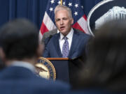 FILE - Assistant Attorney General Matthew Olsen of the Justice Department&rsquo;s National Security Division speaks during a news conference at the Department of Justice in Washington, May 16, 2023. With just seven weeks until the end of the year, the Biden administration is running out of time to win the reauthorization of a spy program it says is vital to preventing terrorism, catching spies and disrupting cyberattacks. The tool is called Section 702 of the Foreign Intelligence Surveillance Act.