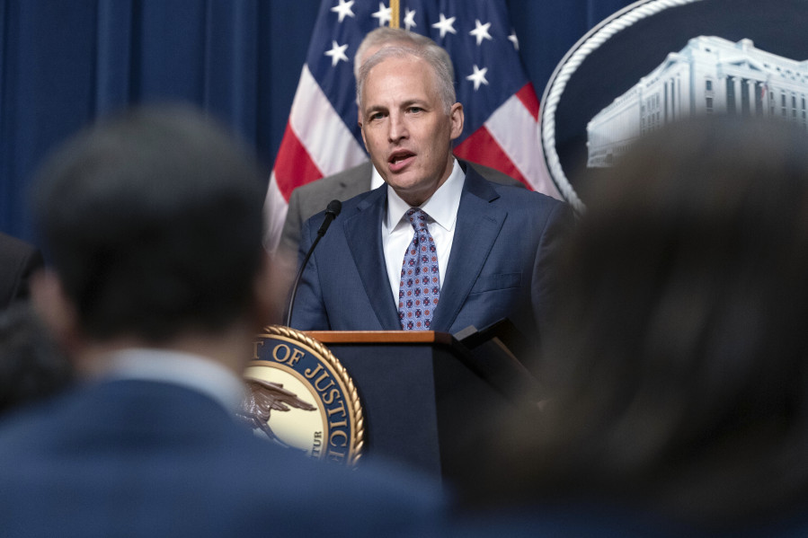 FILE - Assistant Attorney General Matthew Olsen of the Justice Department&rsquo;s National Security Division speaks during a news conference at the Department of Justice in Washington, May 16, 2023. With just seven weeks until the end of the year, the Biden administration is running out of time to win the reauthorization of a spy program it says is vital to preventing terrorism, catching spies and disrupting cyberattacks. The tool is called Section 702 of the Foreign Intelligence Surveillance Act.