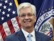 FILE - Federal Reserve Board of Governors member Christopher Waller poses for a photo on May 23, 2022, in Washington. Waller said Tuesday, Nov. 28, 2023 that the U.S. economy is cooling and inflation is steadily slowing, suggesting that the Fed&#039;s interest rate policies are succeeding in getting price increases back to the central bank&#039;s 2%.