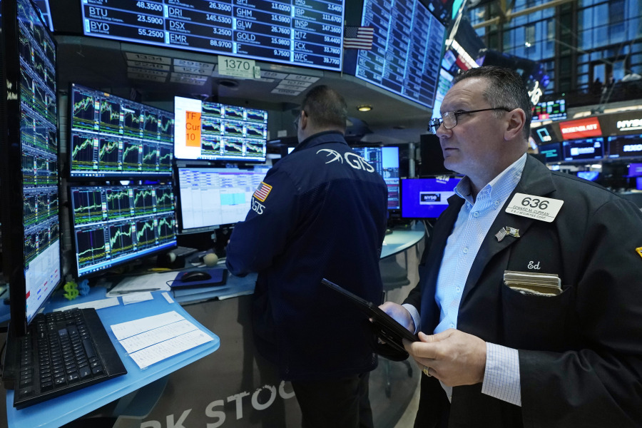 Trader Edward Curran, right, works on the floor of the New York Stock Exchange, Wednesday, Nov. 1, 2023. U.S. stocks are drifting Wednesday as Wall Street waits to hear what will come out of the Federal Reserve&rsquo;s latest announcement on interest rates.