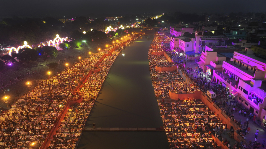 Lamps light up the banks of the river Saryu on the eve of the Hindu festival of Diwali, in Ayodhya, India, Saturday, Nov. 11, 2023. Ayodhya city in the northern Indian state of Uttar Pradesh Saturday set a record by lighting over 2.2 million earthen oil lamps during Deepotsav celebrations on the eve of Diwali, creating a new Guinness World Record for lighting lamps in such a large number, according to state tourism department.