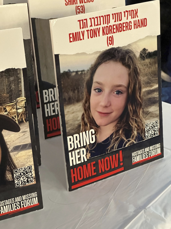 A placard with a portrait of Emily Hand, one of the hostages taken in the Oct. 7 incursion into Israel by Hamas militants, is displayed at a New York synagogue on Oct. 13, 2023. Emily&rsquo;s family was initially told she had been killed, learning only recently she was alive and held in captivity in the Gaza Strip.