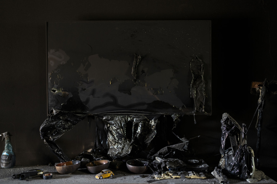 A melted television inside a destroyed house in kibbutz Kfar Azza, Israel, near the Gaza Strip, Tuesday, Nov. 7, 2023. The kibbutz was attacked during the Hamas cross-border attack on Oct. 7, killing and capturing members of its community.