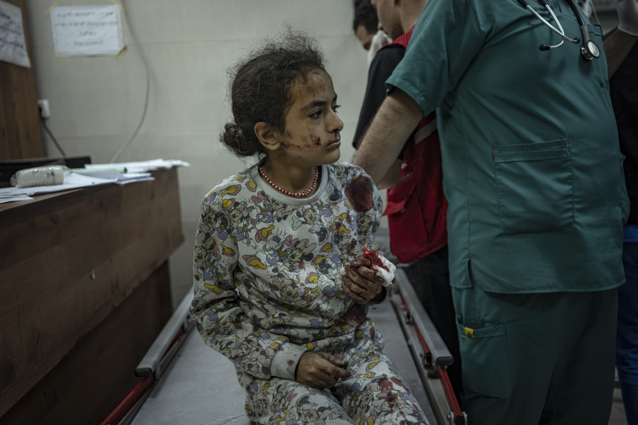 A Palestinian wounded in Israeli bombardment of the Gaza Strip is brought to a hospital in Khan Younis, Wednesday, Nov. 15, 2023.