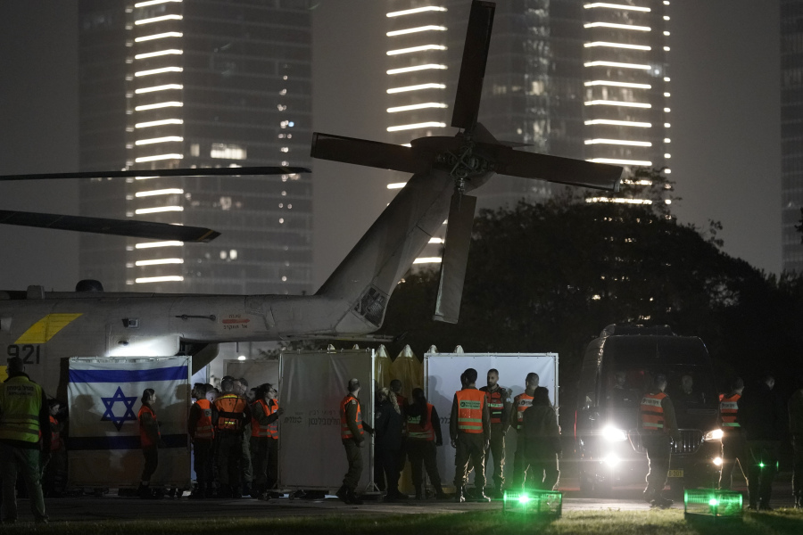 The exit of a helicopter is covered as hostages get-off, after being released from Gaza, at the helipad of the Schneider Children&rsquo;s Medical Center in Petah Tikva, Israel, Sunday Nov. 26, 2023. The cease-fire between Israel and Hamas was back on track Sunday as the militants freed 17 more hostages, including 14 Israelis and the first American, in exchange for 39 Palestinian prisoners in a third set of releases under a four-day truce.