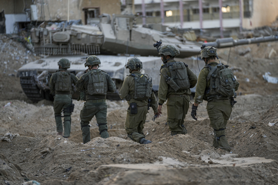 Israeli soldiers are seen during a ground operation in the Gaza Strip, Wednesday, Nov. 8, 2023. Prime Minister Benjamin Netanyahu did not elaborate this week when he said that Israel would maintain indefinite &ldquo;overall security responsibility&rdquo; in Gaza once it removes Hamas from power in response to a bloody Oct. 7 cross-border raid by the Islamic militant group. That could complicate any plans to hand governing responsibility to the Palestinian Authority or friendly Arab states, and bog Israel down in a lengthy and bloody war of attrition.