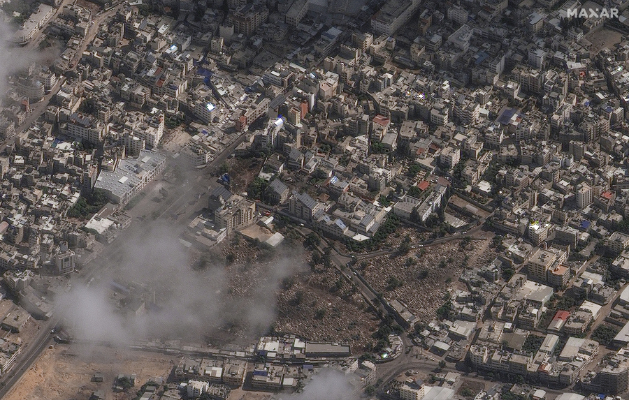 FILE - This image provided by Maxar Technologies on Wednesday, Oct. 18, 2023, shows an overview of the Al-Ahli Hospital, center of image, in Gaza City the day after a deadly explosion.