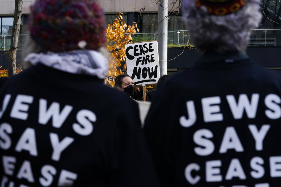 A protester holds a &ldquo;Cease Fire Now&rdquo; sign during a Jewish Voice for Peace rally that shut down the Henry M. Jackson Federal Building while demanding that Sen. Patty Murray, D-Wash., call for a ceasefire in the Israel-Hamas war Friday, Nov. 3, 2023, in Seattle.